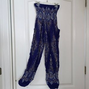 Patterned flow pants by Rayon. Elastic waist, cuffed ankle